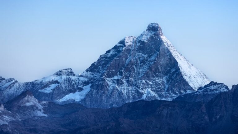 Breathtaking view of the snow-covered Matterhorn peak in the Alps during winter.